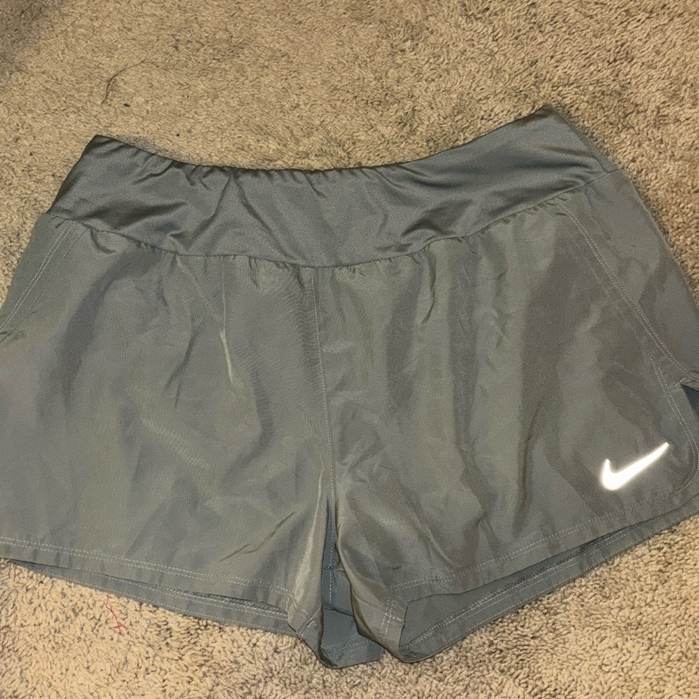 Nike dri-fit size L women’s athletic shorts in light grey